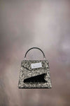 Snatched handbag small