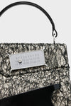Snatched handbag small
